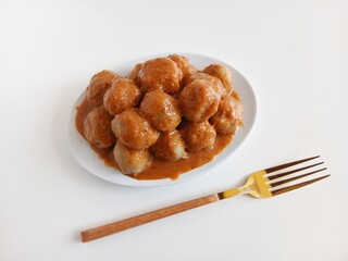 Cilok is a traditional food from Bandung, West Java, Indonesia. This food made from tapioca flour and serve with spicy peanut sauce