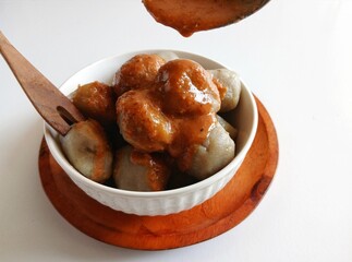 Cilok is a traditional food from Bandung, West Java, Indonesia. This food made from tapioca flour and serve with spicy peanut sauce
