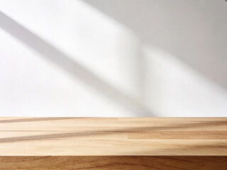 Empty Light Wood Table or Countertop with Sunlight Shadows on White Wall Background