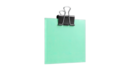 Green Note Held by Binder Clip on White Background