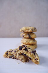 Close-up of homemade chocolate chip cookies with a soft and chewy texture, showing melted chocolate pieces inside