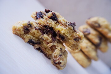 Close-up of homemade chocolate chip cookies with a soft and chewy texture, showing melted chocolate pieces inside