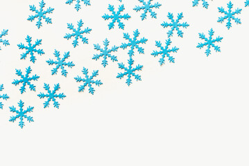 snowflakes on a white background. Blue snowflake background. Snowflake texture.