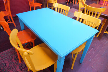 Colorful table and chairs in a casual dining space
