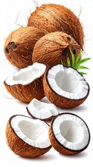 Coconuts whole, halved, and sliced, with green leaves