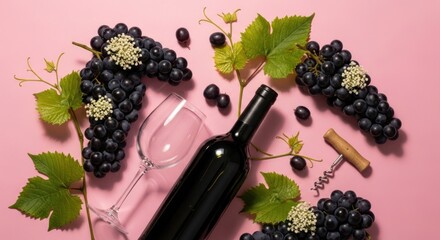 A bottle of red wine with a glass and corkscrew on a pink background.