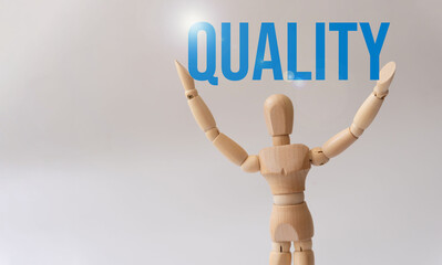 Wooden mannequin with the word 