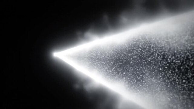 Triangular prism of radiant dust illuminated