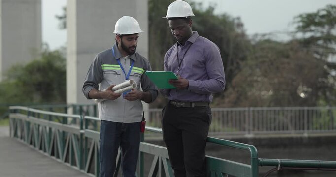 Engineer presents railway development proposal to investor during site visit, discussing green initiatives, future expansion, regional growth, Professional collaboration, stakeholder engagement 
