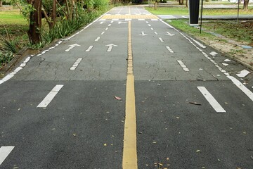 Asphalt road of bicycle park in public park