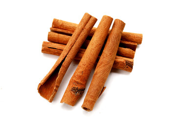 Dried cinnamon sticks arranged in a bundle.