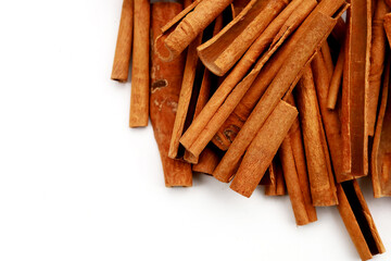Dried cinnamon sticks arranged in a bundle.