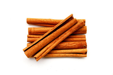 Dried cinnamon sticks arranged in a bundle.