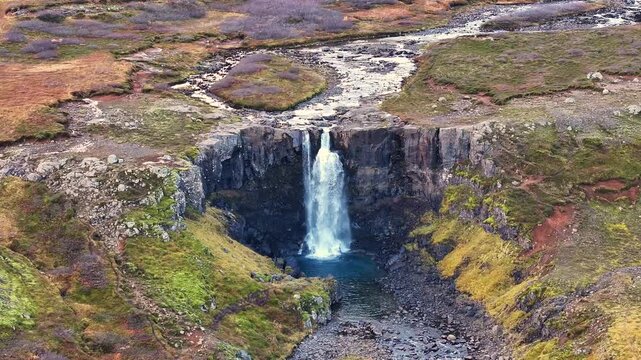 Aerial view of the Gufufoss falls near Seydisfjordur fjord - Iceland