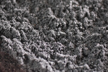 Preserved Egg salted egg: A Chaiya Salted Duck Egg Coated in Clay and Charcoal in white background from Chaiya district, Surat Thani province, Thailand, Chaiya Salted Egg