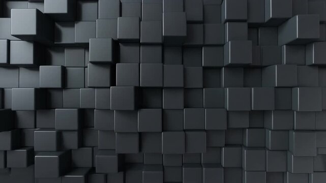 A wall of dark grey 3D cubes in a staggered pattern, creating a sense of depth and texture