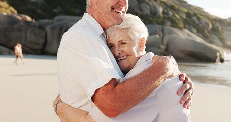 Senior, happy couple and beach with hug for relationship, retirement holiday or love in nature. Elderly, man and woman with smile or embrace on ocean coast for summer weekend, outdoor getaway or date