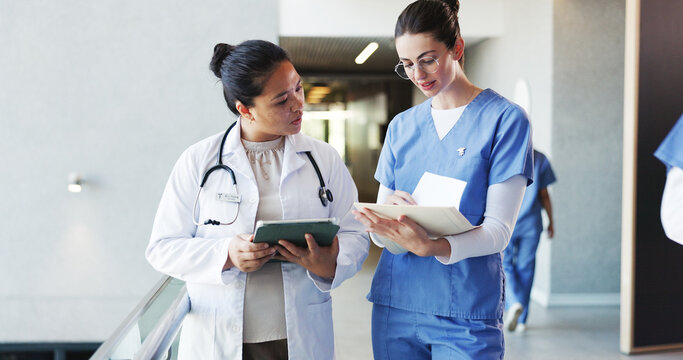 Women, doctors and document with tablet in hospital for planning, medical report and schedule notes. Staff, digital or team brainstorming with patient chart, surgery information and treatment records