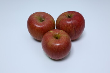 red apples on a white background