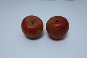 red apples on white background