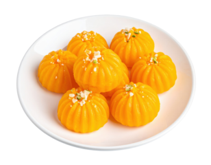 Kesariya Peda Saffron-Infused Indian Sweets Garnished with Pistachios on a White Plate
