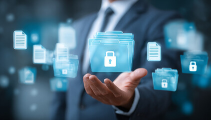 Businessman in formal suit holding digital folder icons representing data security