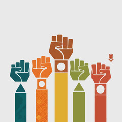 Diverse raised fists in solidarity, symbolizing unity, empowerment, and social justice causes.