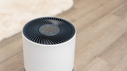 Modern air purifier with sleek design and control panel, placed on wooden floor, enhancing indoor air quality and promoting fresh air concept