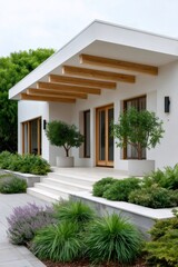 Fototapeta premium Modern house exterior with beautiful landscaped garden and porch