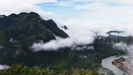 Nong Khiaw, Laos – Scenic Mountain Views, Nam Ou River Landscapes and Tropical Nature. Scenic mountain views, lush jungle and the Nam Ou River in Nong Khiaw, Laos.