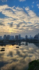 sunset over the river city