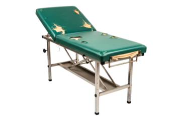 Old damaged medical examination table with torn green vinyl top isolated on a transparent background