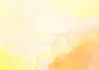 黄色とオレンジの水彩絵の具がにじむ背景テクスチャ