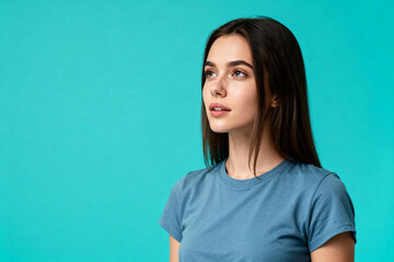 Fototapeta premium Young Woman with Long Dark Hair in Blue T-Shirt