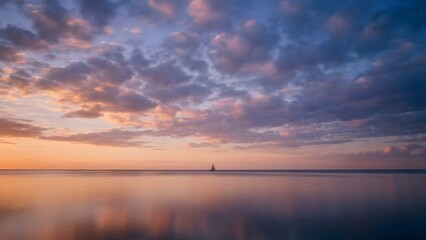 Serene Sunset Over Calm Lake with Vibrant Sky.