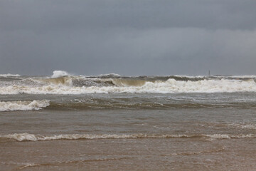 Winter storm Byron on the Mediterranean coast of Tel Aviv and waves crashing on a sandy beach