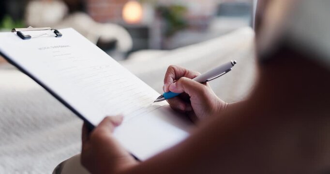Person, hands and writing with medical form for clinic registration, application or health survey. Closeup, patient or filling documents with policy for diagnosis, assessment or healthcare exam