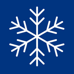 White frozen snowflake isolated on dark blue background