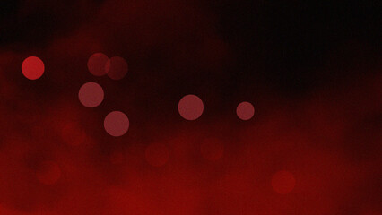 Red bokeh light leaks overlay effect on dark background; abstract, Christmas, retro film grain.