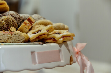 Close-up view of Christmas cookies on a plate, showcasing festive holiday treats perfect for winter celebrations, seasonal baking, and holiday design projects