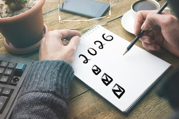 man writing plan 2026