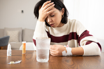 sad sick woman in home