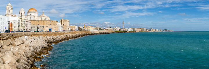 Cadiz, Spain - April 16, 2025: Typical view of the Bay of Cadiz with the sea in the foreground in the city of Cadiz, Spain © josevgluis