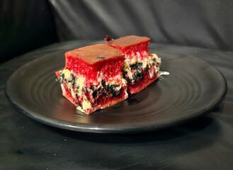 piece of cake Martabak manis red velvet with black cookies and cheese filling.Sweet Indonesian pancake filled with black cookies and cheese.Sweet red velvet martabak,Terang bulan 
