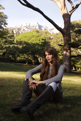  beautiful young slavic woman with long dark natural hair in elegant clothes