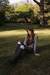  beautiful young slavic woman with long dark natural hair in elegant clothes