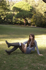  beautiful young slavic woman with long dark natural hair in elegant clothes