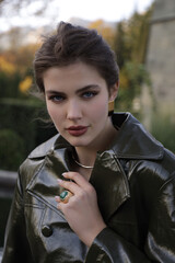  beautiful young slavic woman with long dark natural hair in elegant clothes