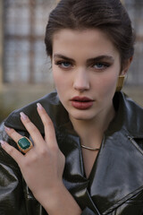  beautiful young slavic woman with long dark natural hair in elegant clothes