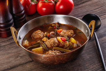 Tomato Soup with meatballs and vegetables